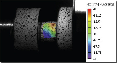 Full-field contour plot of the transversal strain (Exx) overlaying the raw image at t=4.4 ms.png